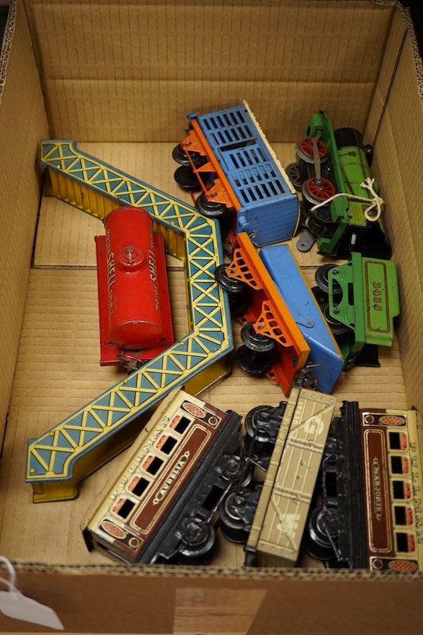 A collection of Hornby 0 gauge tinplate clockwork railway, including; a boxed No.1 Special GWR 0-4-0T locomotive, 5500, complete with original inner card packing pieces, etc., together with a boxed Dinky Toys No.1 Statio